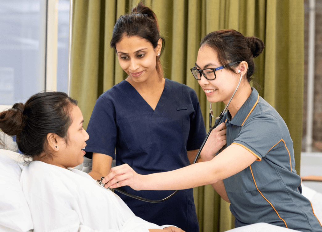 Nurses tending to a patient