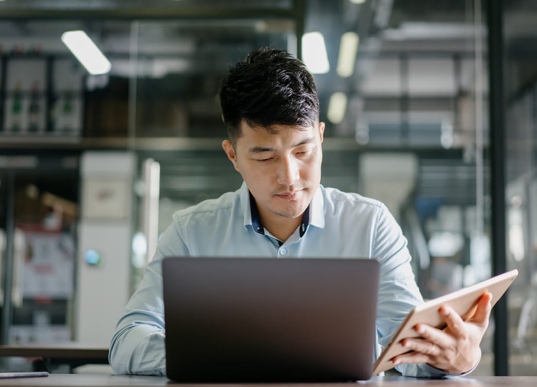 Master of Philosophy | Male working on laptop | Torrens University | LG